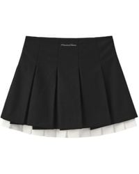 Marissa Chiara - Logo Pleated Skirt - Lyst