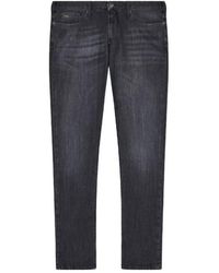 Emporio Armani - Logo-Plaque Faded Jeans - Lyst