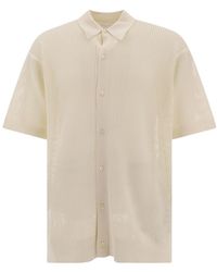 Prada - Logo Embroidered Knitted Polo Shirt - Lyst