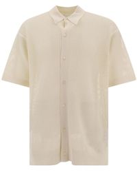 Prada - Logo Embroidered Knitted Polo Shirt - Lyst