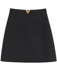 Valentino - Logo Plaque Mini Skirt - Lyst