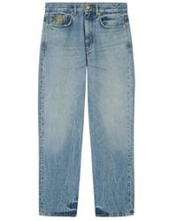 Versace - Logo-Patch Pencil Jeans - Lyst