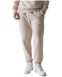 KTZ - New York Yankees Mlb League Essential Cream Joggers - Lyst