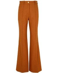 Patou - Crease Detailed Flared Pants - Lyst