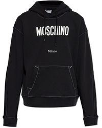 Moschino - Logo Print Drawstring Hoodie - Lyst