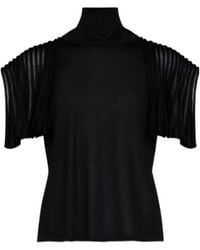 Alaïa - Alaïa Pleated Sleeve Turtleneck Top - Lyst