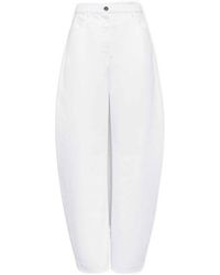 Alaïa - Low-Rise Round-Toe Jeans - Lyst