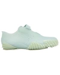 PUMA - Round Toe Studded Sneakers - Lyst