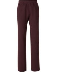 Givenchy - Logo-Embossed Jogger Pants - Lyst