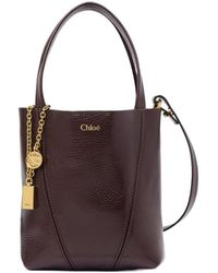 Chloé - Chloé Spin Logo Printed Small Top Handle Bag - Lyst