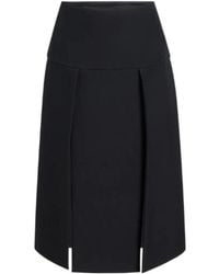 KHAITE - Kidd Pleated Midi Skirt - Lyst