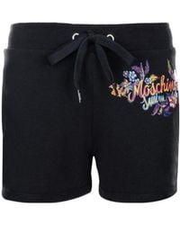Moschino - Letter Printed Lace-Up Shorts - Lyst