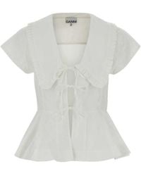 Ganni - Ruffled Peplum Tie-Front Top - Lyst