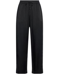 Saint Laurent - Loose-Fitting Solid-Color Trousers - Lyst