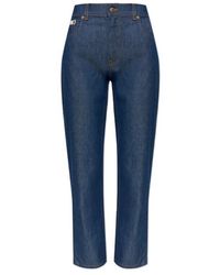 Moschino - Logo-Patch Tapered Jeans - Lyst
