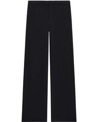 Courreges - Courrèges Elasticated Waist Bootcut Track Pants - Lyst