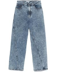 Alaïa - Alaïa Twisted Straight Cut Jeans - Lyst