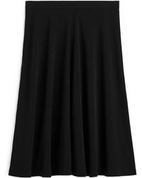 TOTEME - Totême A-Line Fluid Midi Skirt - Lyst