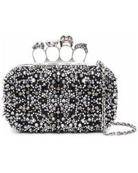 McQueen - Four-Ring Skull Stud Embellished Clutch Bag - Lyst