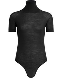 Alaïa - Alaïa Short Sleeved Knitted Sheer Bodysuit - Lyst