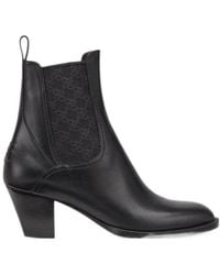 Fendi - Tronchetto Ankle Boots - Lyst
