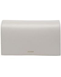 Jil Sander - Logo Embossed Foldover Crossbody Bag - Lyst