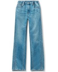 Alexander Wang - Logo-Embossed Denim Balloon Jogger Pants - Lyst