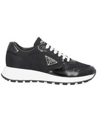 Prada - Logo Plaque Low-Top Sneakers - Lyst
