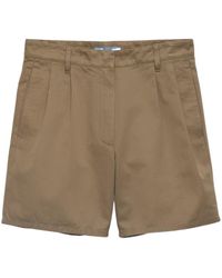 Prada - Logo-Patch Pleated Shorts - Lyst