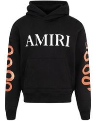 Amiri - Long Sleeved Logo Printed Hoodie - Lyst