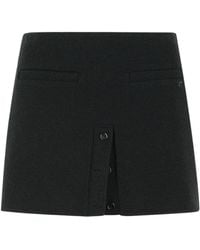 Courreges - Courrèges Buttoned Tweed Mini Skirt - Lyst