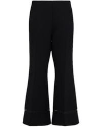 KHAITE - Wallace Flared Poly Pants - Lyst