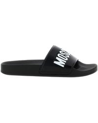 Moschino - Logo-Embossed Slides - Lyst