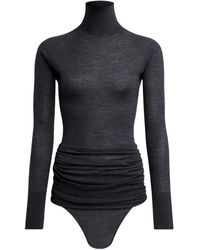 Alaïa - Alaïa High-Neck Draped Knit Bodysuit - Lyst
