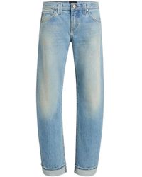 KHAITE - Karo Low-Rise Curved Leg Jeans - Lyst