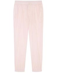 Givenchy - Logo-Embroidered Shell Track Pants - Lyst