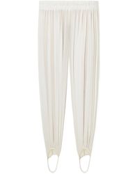 Alaïa - Shirred Stretch-Silk Georgette Tapered Pants - Lyst