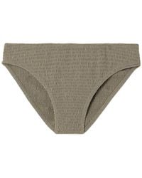 TOTEME - Mid-Rise Smocked Bikini Bottoms - Lyst