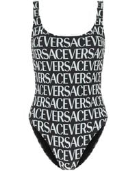 Versace - Allover Logo Printed Low-Back Swimsuit - Lyst