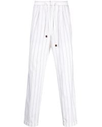 Brunello Cucinelli - Striped Drawstring Cotton Trousers - Lyst