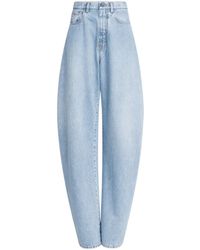 Alaïa - Round Wide-Leg Jeans - Lyst