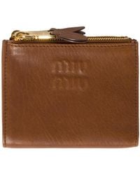 Miu Miu - Logo Embossed Zipped Wallet - Lyst