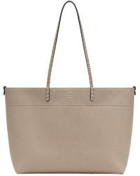 Fendi - Roll Logo Embossed Shoulder Bag - Lyst