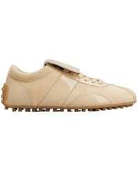Tod's - Logo Embossed Low-Top Sneakers - Lyst