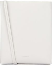 Calvin Klein - Logo Stamp Crossbody Bag - Lyst
