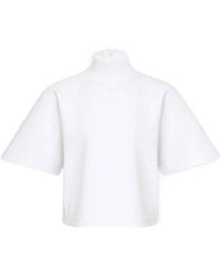 Alaïa - Alaïa Ribbed High Neck T-Shirt - Lyst