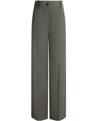 Patou - Flared Pressed-Crease Trousers - Lyst