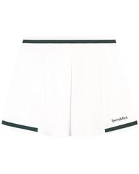 Sporty & Rich - Mila Striped Pleated Mini Skirt - Lyst