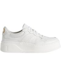 Gucci - GG Embossed Leather Sneaker - Lyst