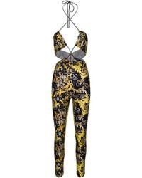 Versace Jeans Couture - Logo Couture-Print Halterneck Jumpsuit - Lyst